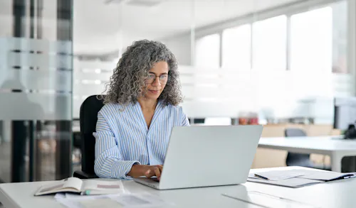 Business woman working laptop in office