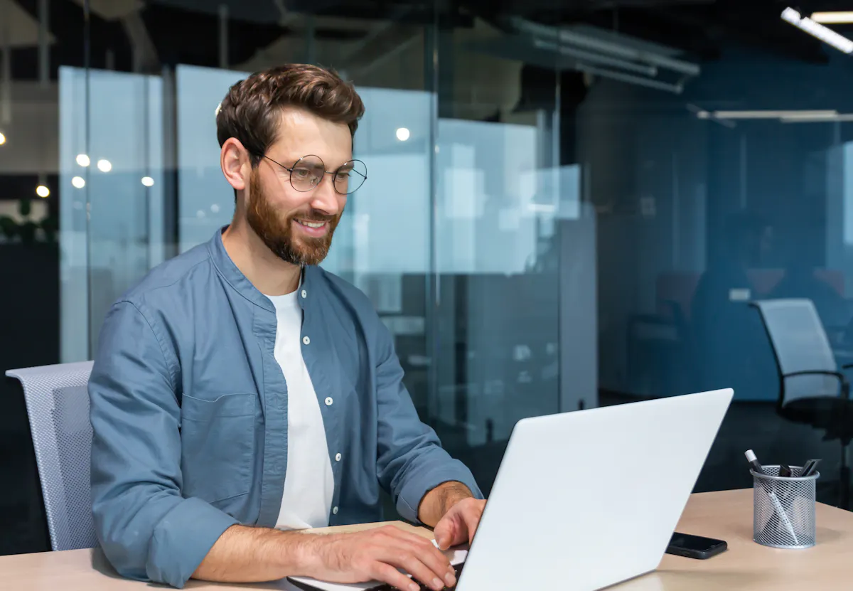 Tech professional working in conference room